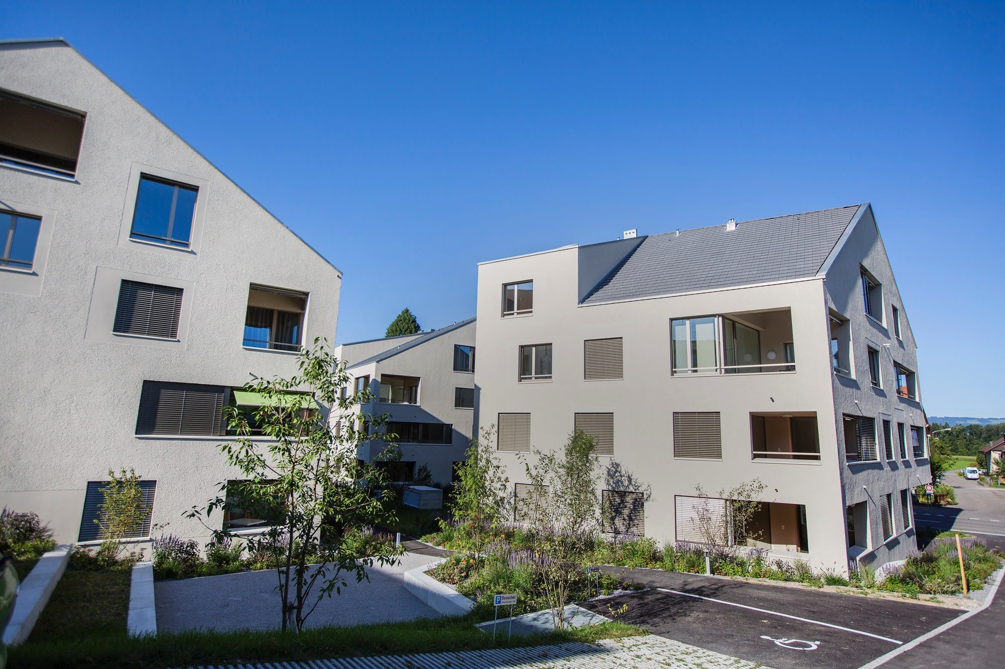 Wohnungsbau,Aussenwärmedämmung,Öffentliche Bauten Wohnüberbauung Schmittenplatz