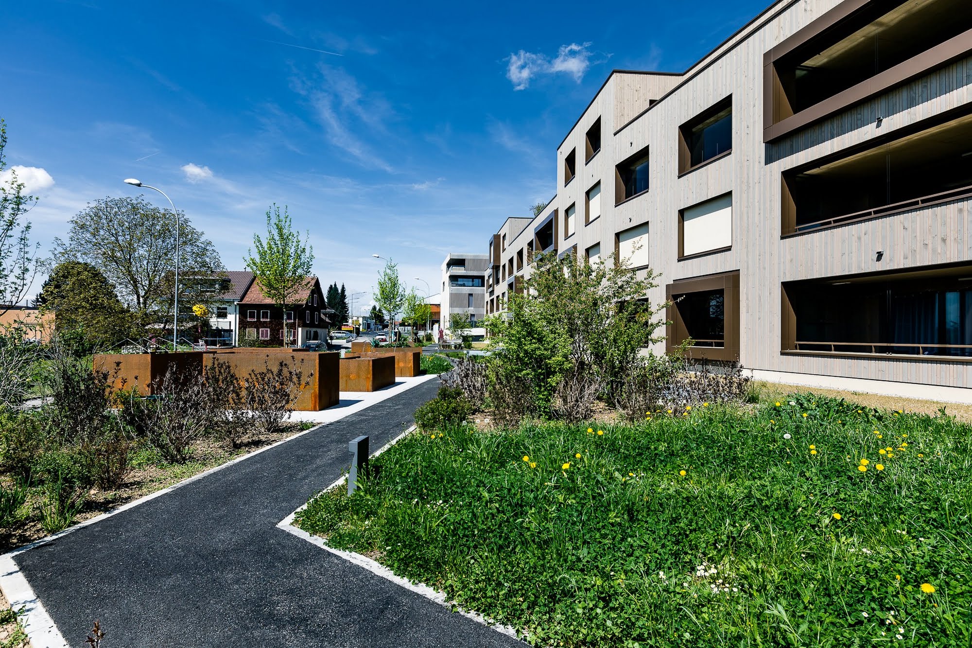 Wohnen MFH Wohnüberbauung Dorf in Schenkon Architektur,Wohnungsbau,Wohnhäuser,Einfamilienhäuser,Mehrfamilienhäuser