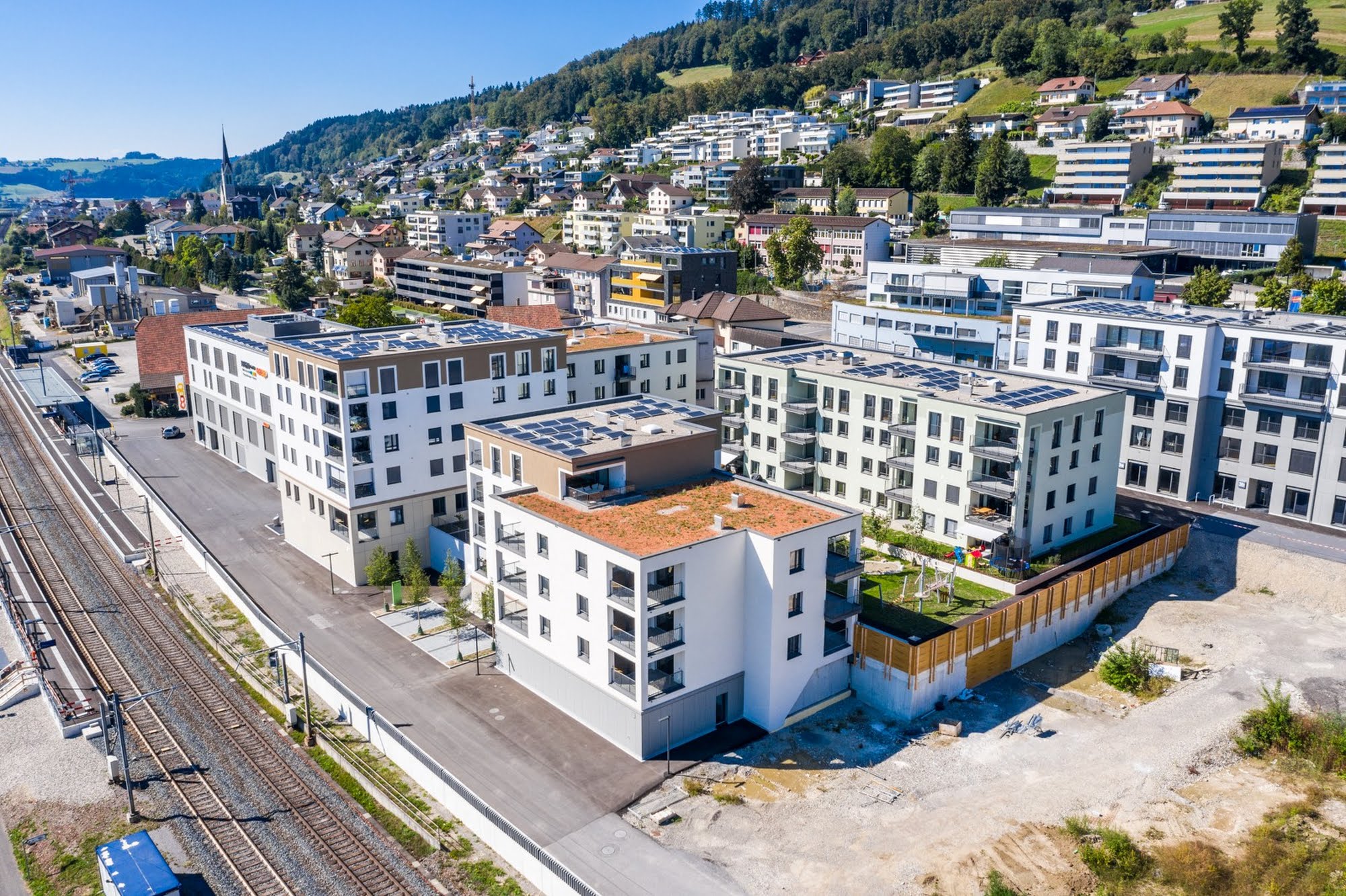 Wohnen MFH,Gewerbe Überbauung Glasi in Wauwil Architektur,Wohnungsbau,Wohnhäuser,Einfamilienhäuser,Mehrfamilienhäuser